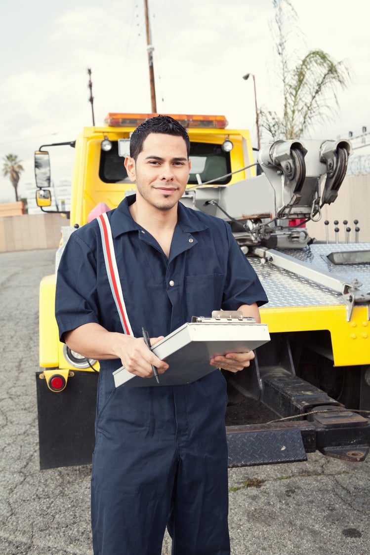 tow truck driver smiling portrait